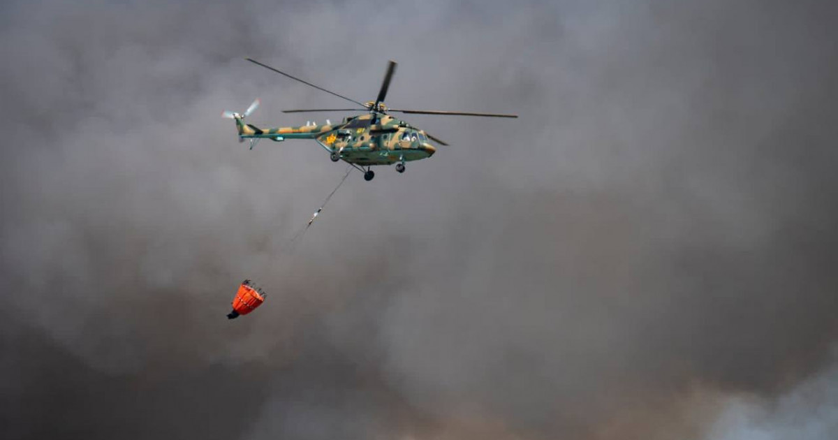 Зүлфия Сүлейменова ормандағы өрт ошағын тікұшақпен айналып ұшып, қарап шықты